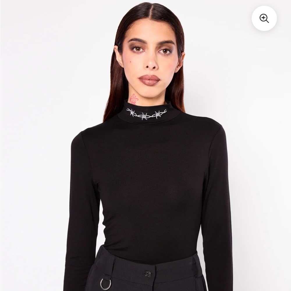 Black longsleeve turtleneck with barbed wire embroidery